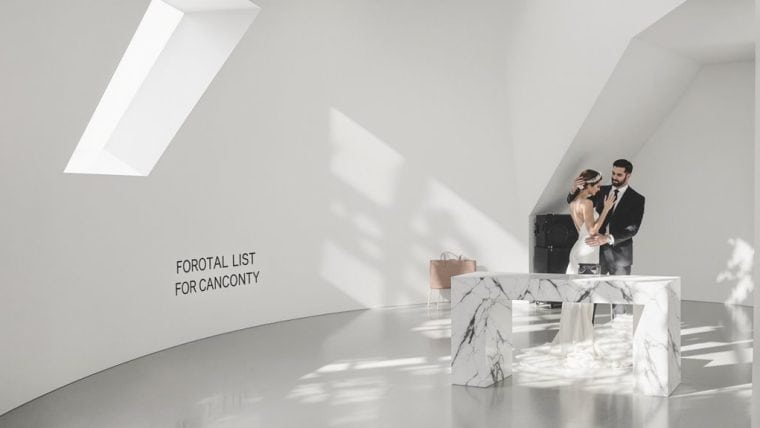 Bride and groom exchanging vows in a sleek, minimalist wedding venue with natural light.