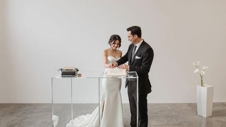 Bride and groom exchanging vows during elegant wedding ceremony.